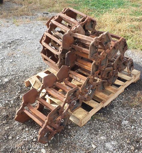 steel skid steer tracks parts|grouser tracks for skid steer.